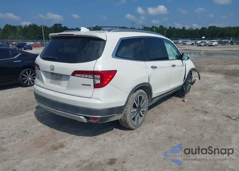 2019 Honda Pilot Touring z USA, uszkodzony, nr VIN 5FNYF5H9XKB001842